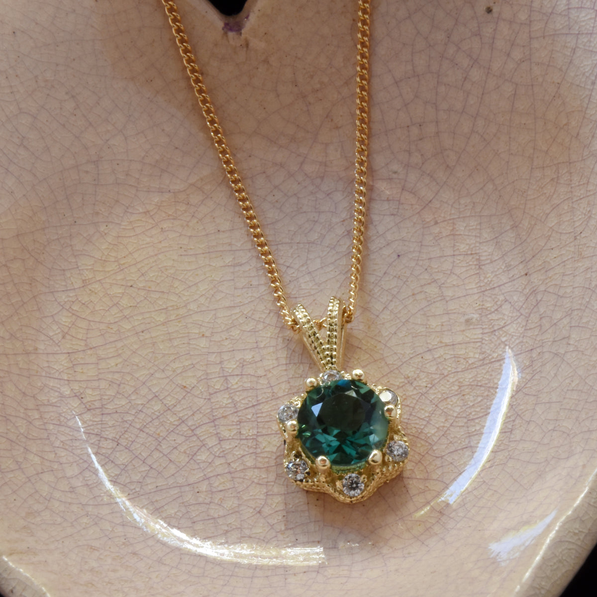 NG4757 Gold Necklace with Green Spinel and Zircons Flower Pendant