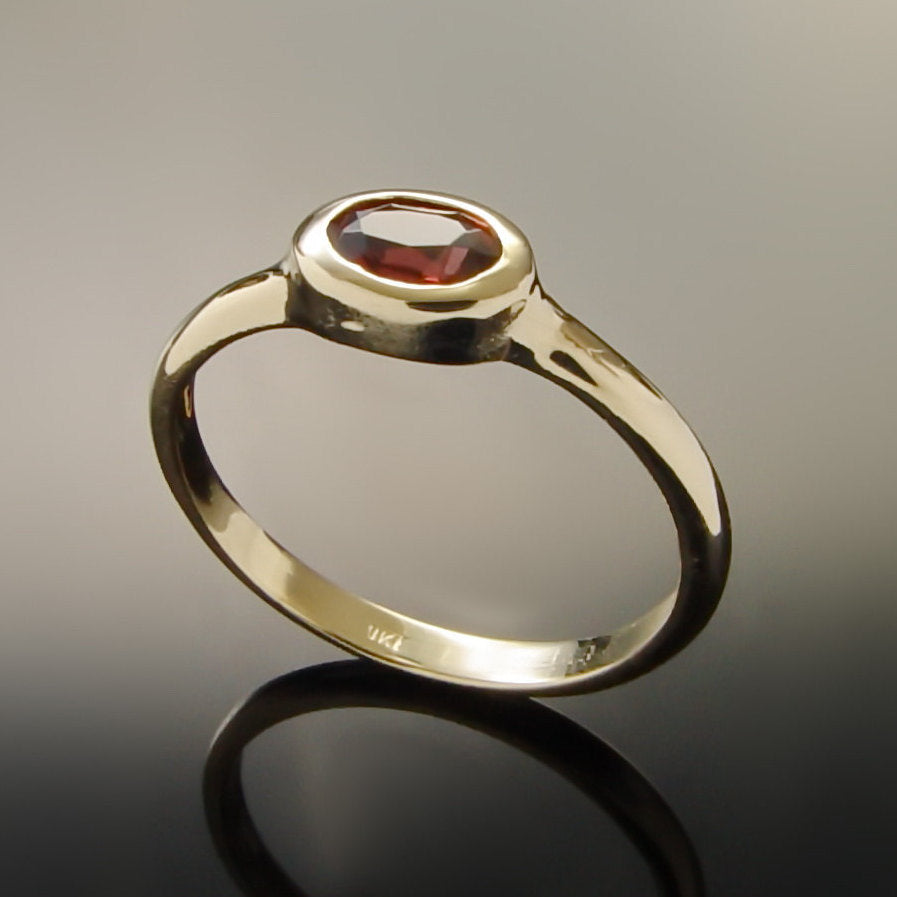 RG1801-2 Modern Gold Ring with Oval Garnet