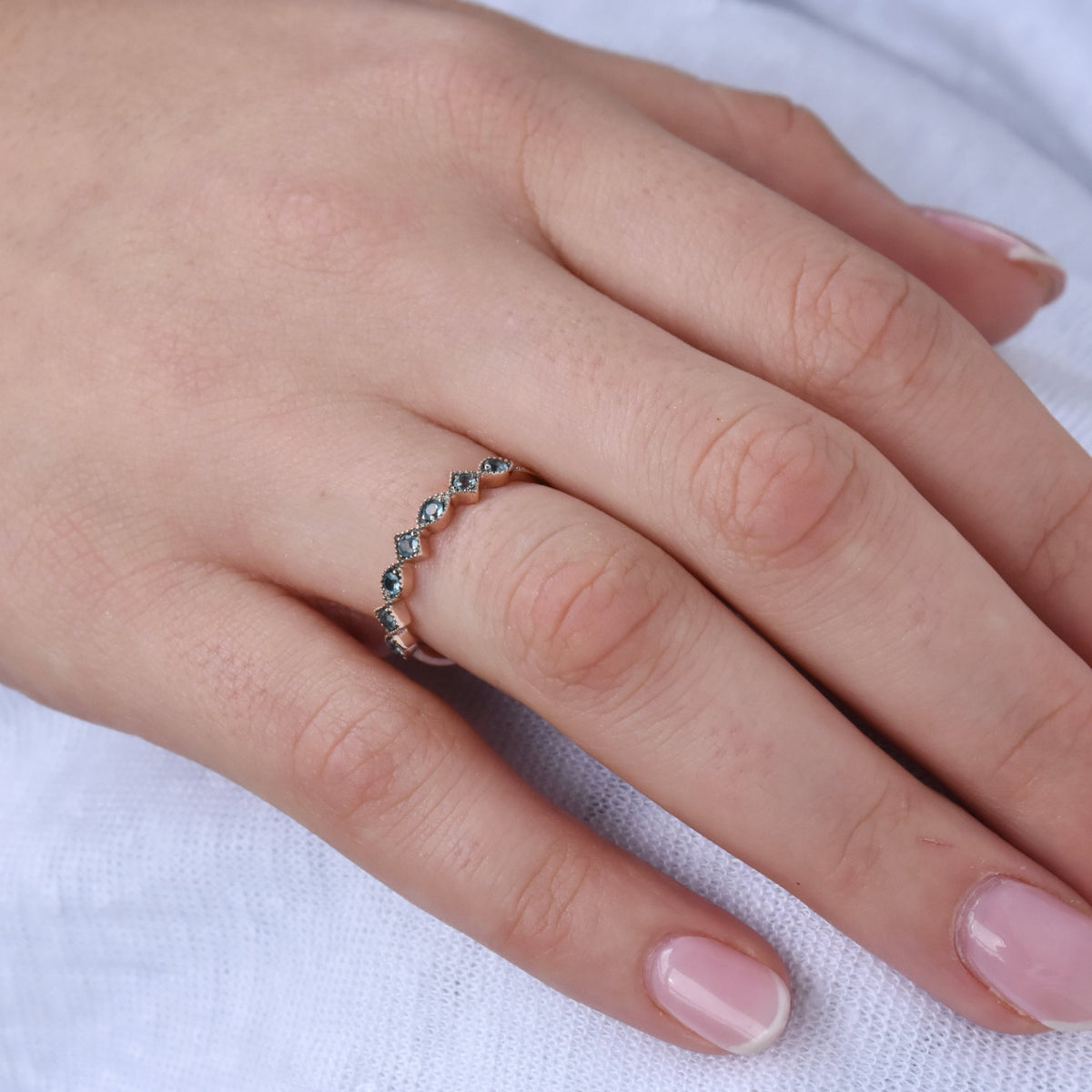 RG1813 Rose Gold Ring set with Blue Topaz stones