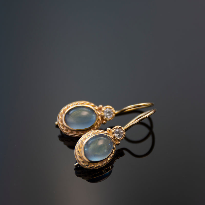 EG0732-1 Gold Drop Earrings with Oval Blue Topaz