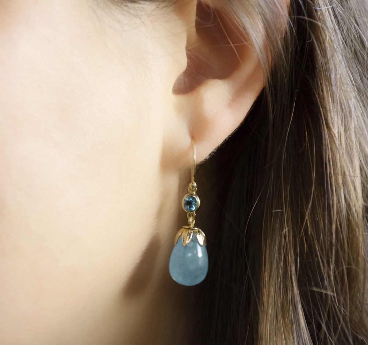 EG0759B Gold Drop Earrings with Aquamarine and Topaz in Leaf Crown Design