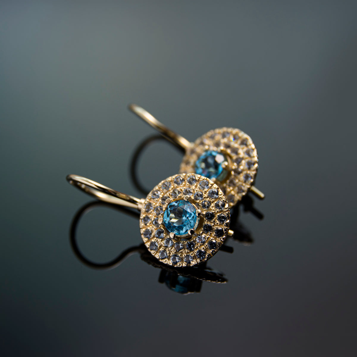 EG2245-1 Round Gold drop earrings with Blue Topaz stones set in a circle