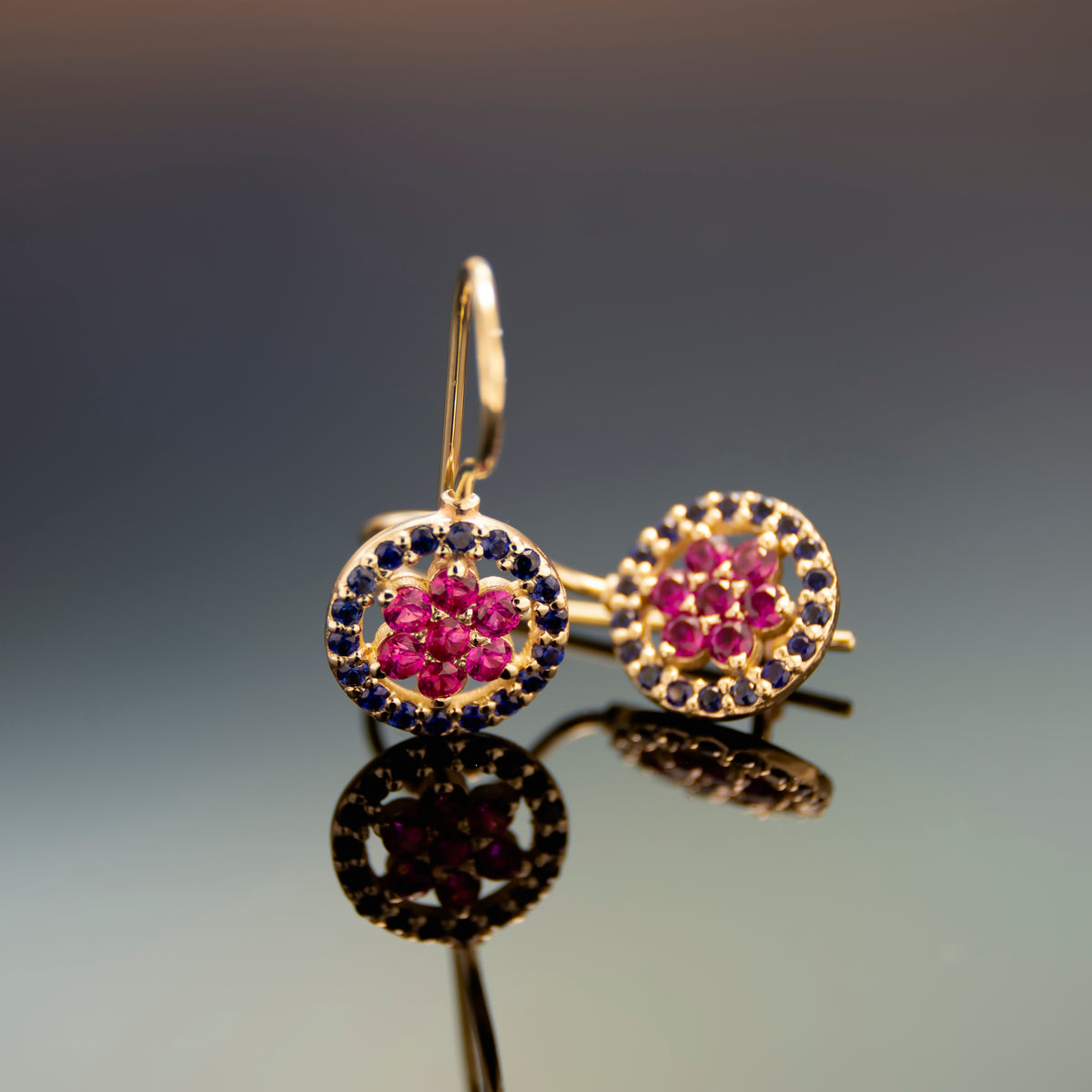 EG2246-1 Gold Drop Earrings with Ruby flower and surrounded by Sapphires