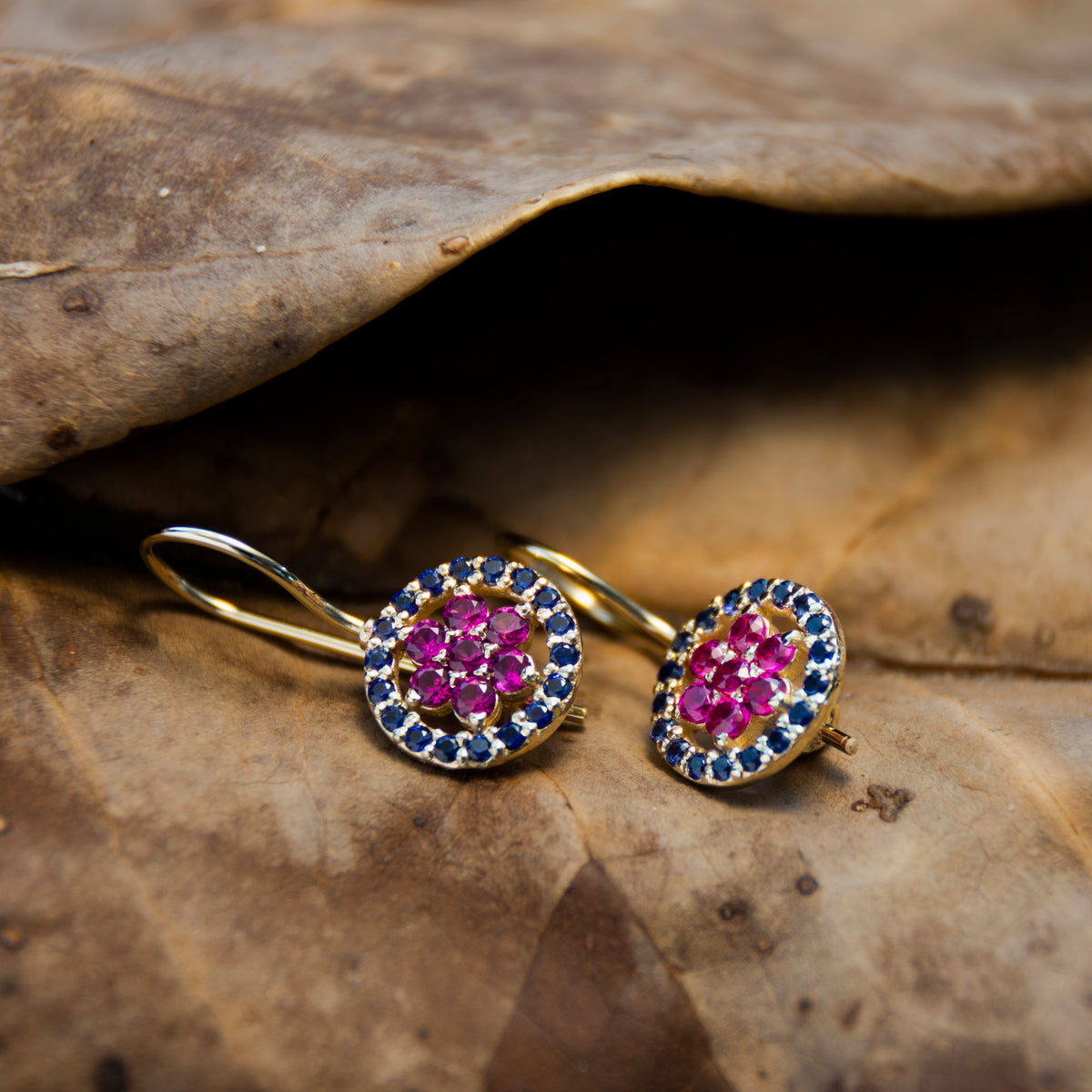 EG2246-1 Gold Drop Earrings with Ruby flower and surrounded by Sapphires