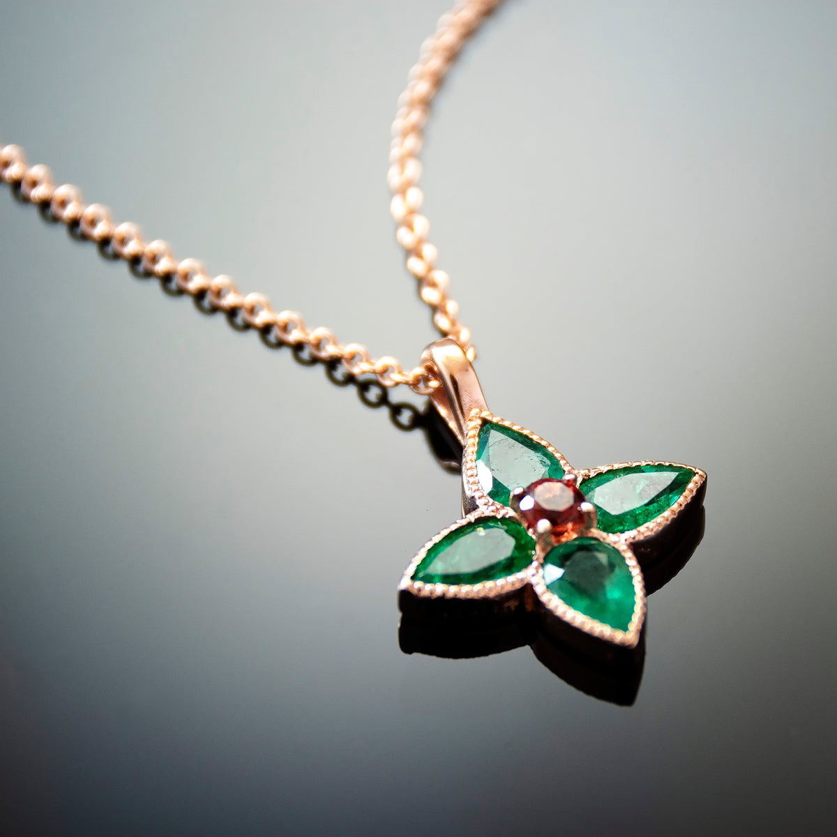 NG4797-1 Rose Gold Clover Pendant Necklace with Emerald and Garnet