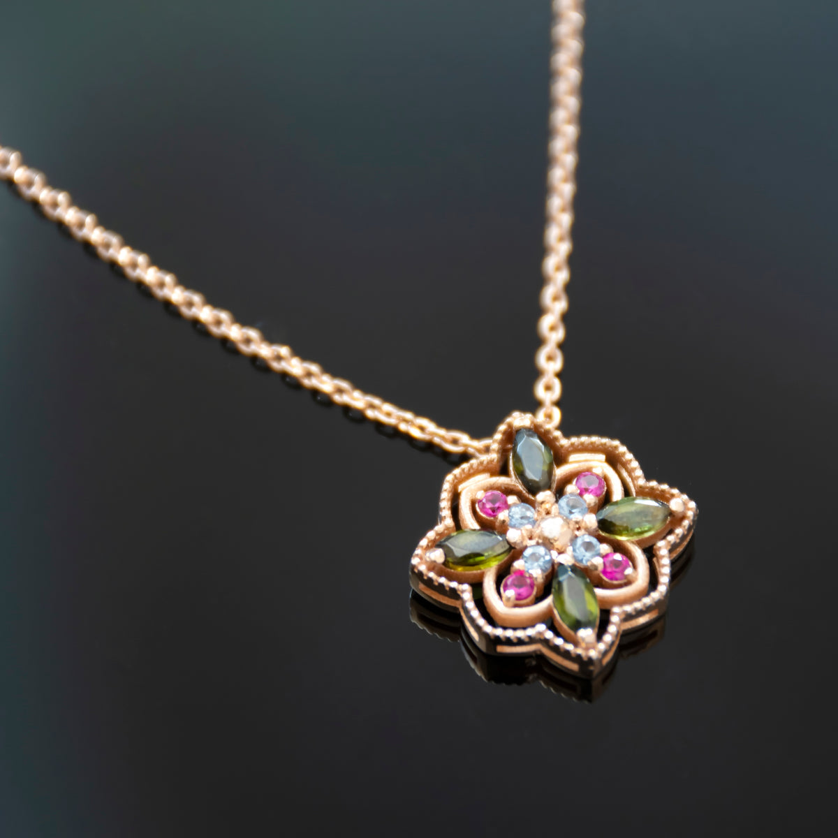 NG4804-1 Rose Gold Mandala Pendant Green Tourmaline, Blue Topaz and Ruby Pendant