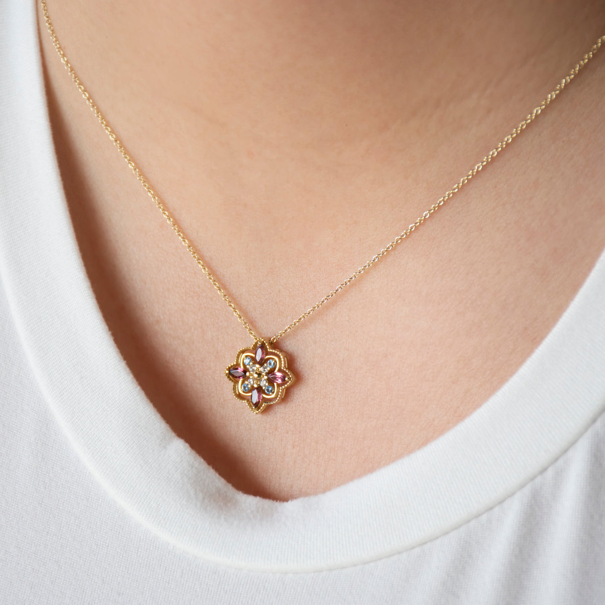 NG4804 Yellow Gold Mandala Pendant Necklace with Pink Tourmaline, Blue Topaz, and Diamonds Pendant