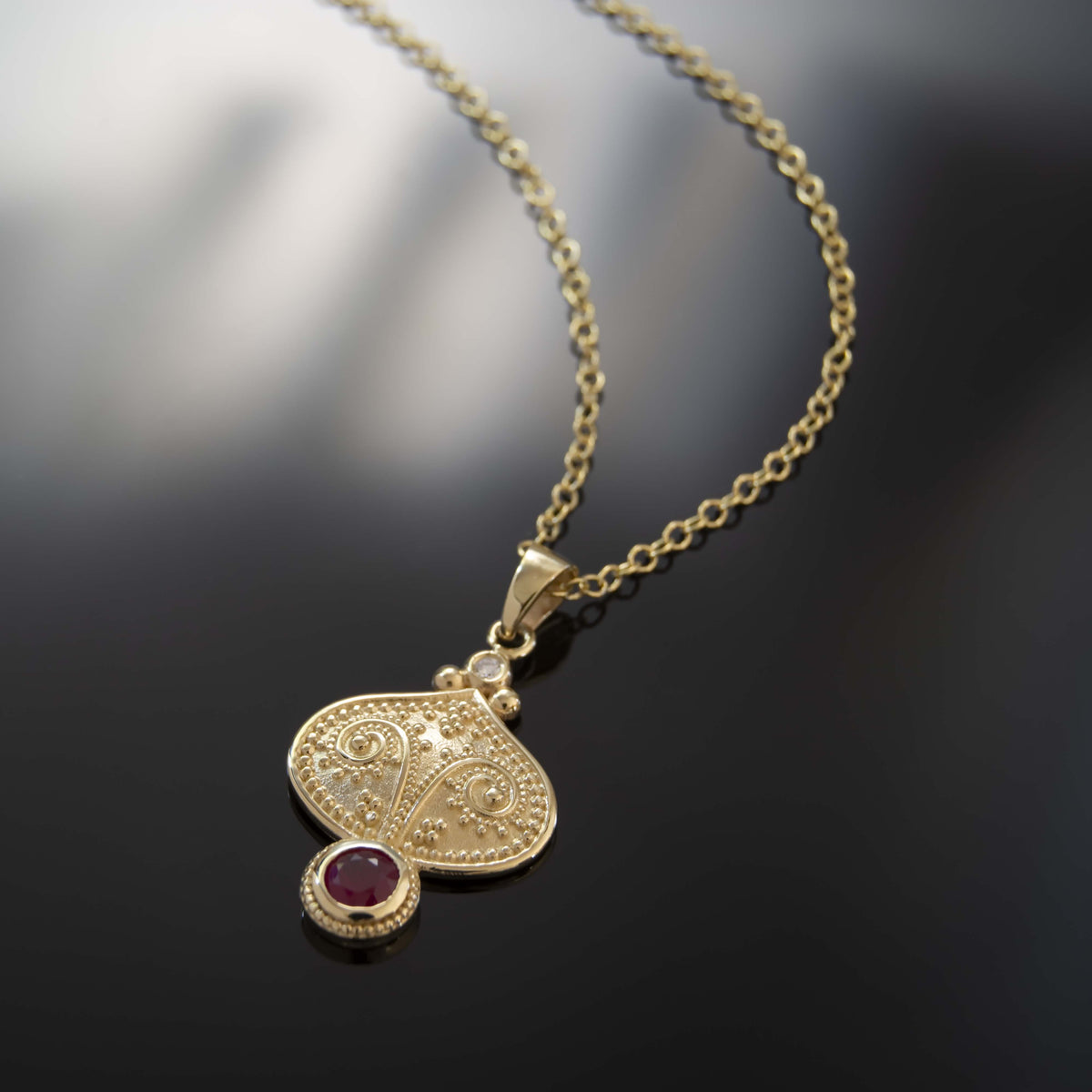 NG4810 Ethnic-Inspired Gold Pendant Necklace with Natural Ruby and Diamond