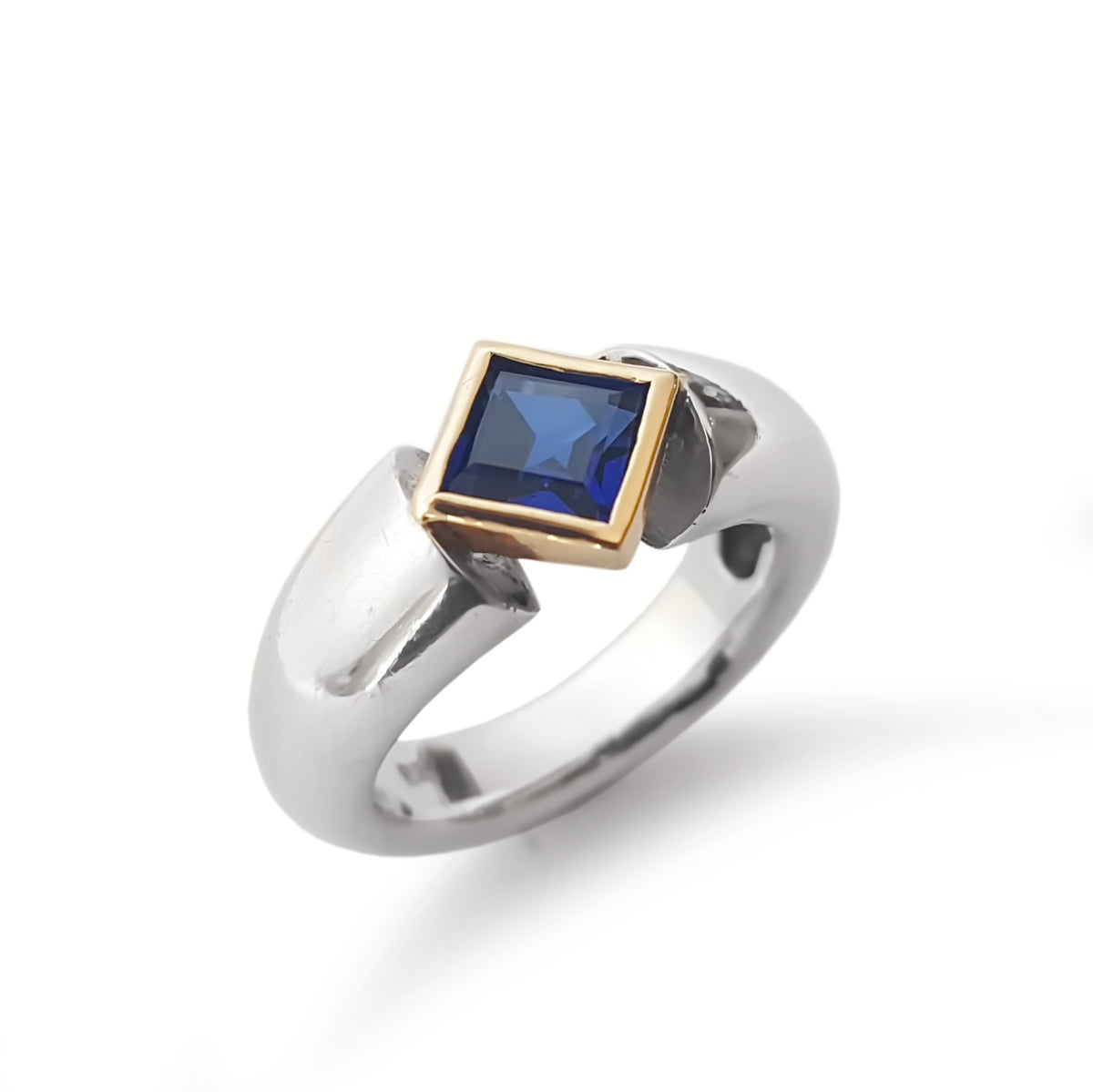 R0922C Square Sapphire on a Chunky Silver Band