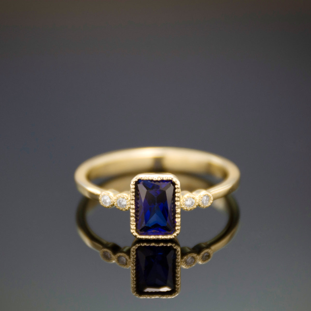 RG1834-2 Gold Ring with Square Blue Sapphire and Zircon Accents