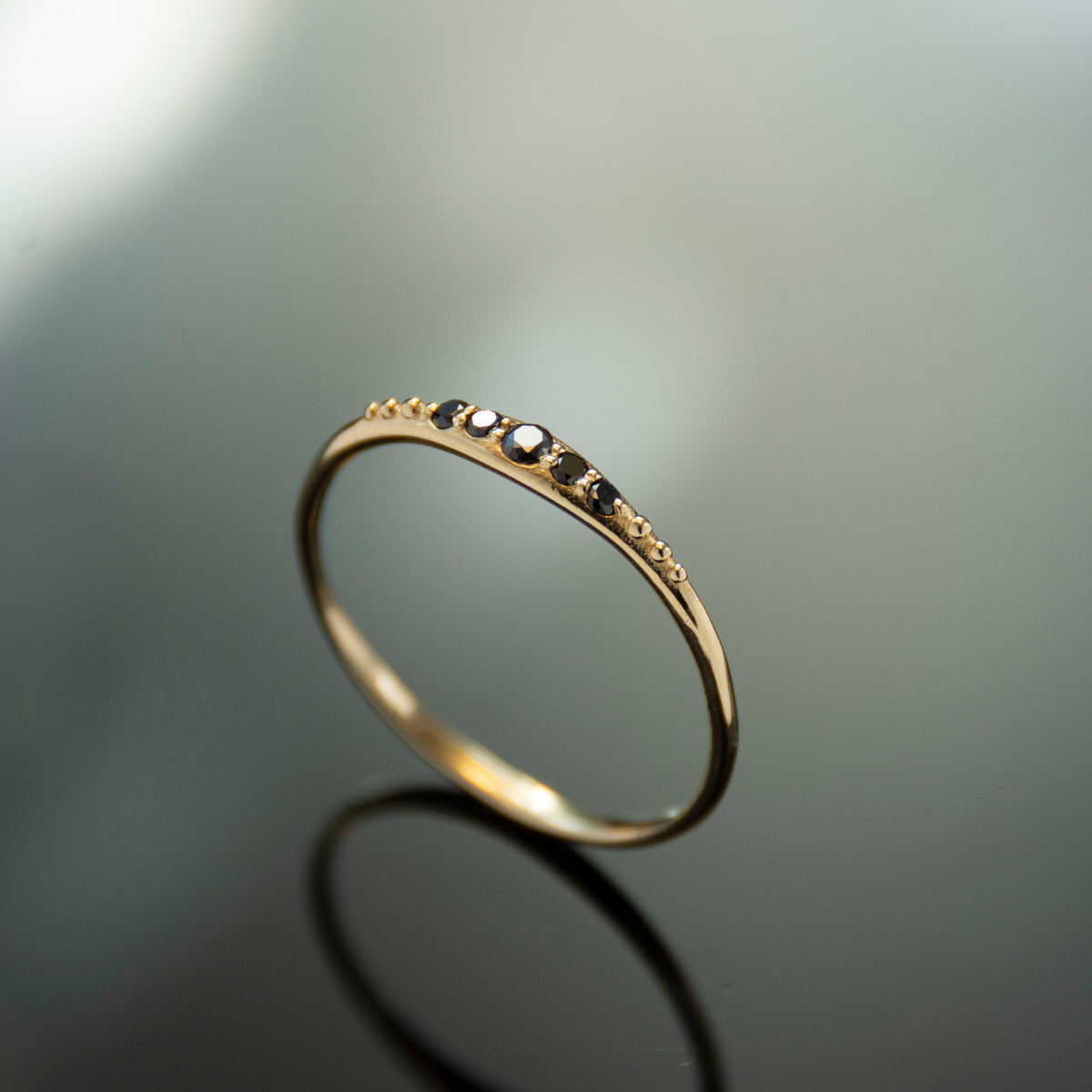 RG1902-2 Gold Skinny Ring with Black Diamonds