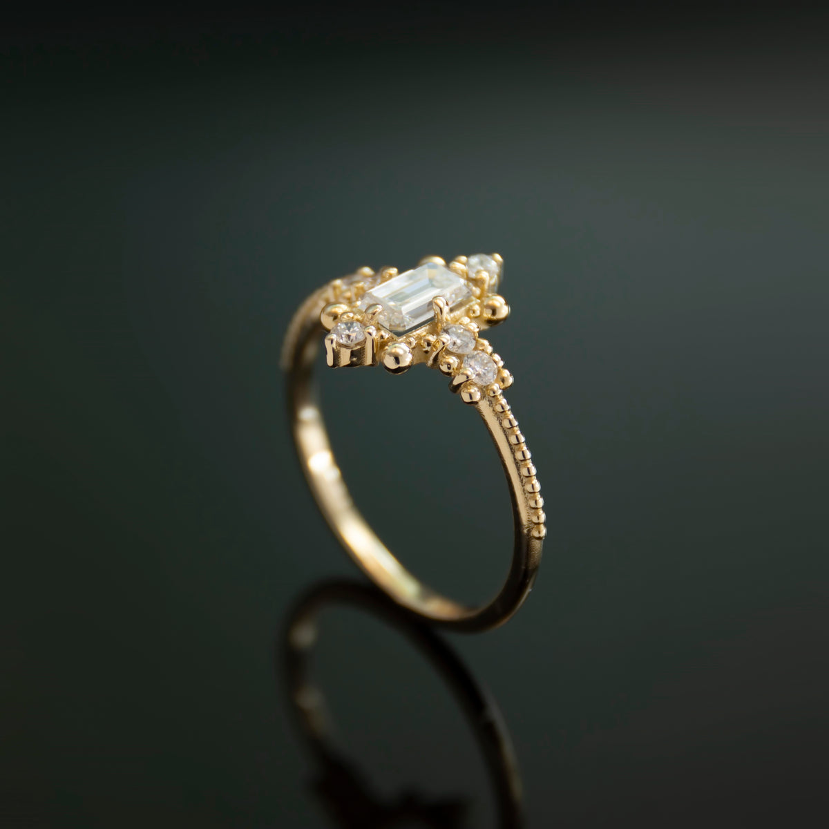 RG1914 Victorian-Inspired Gold Ring with Centered Emerald-Cut Diamond and Accent Diamonds