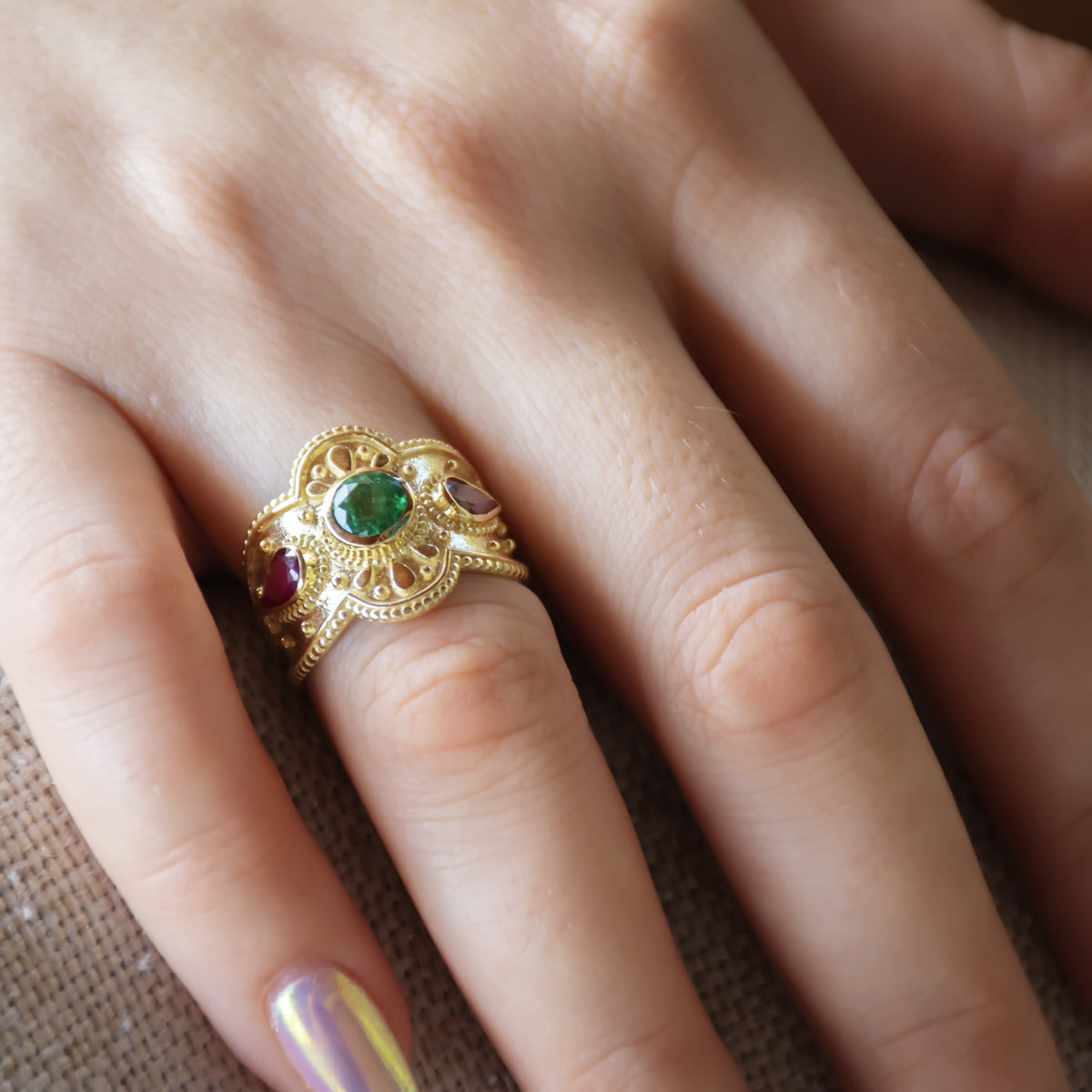 RG1934 Luxurious 14K Gold Statement Ring with Natural Emerald Centerpiece and Pear-Shaped Ruby Accents