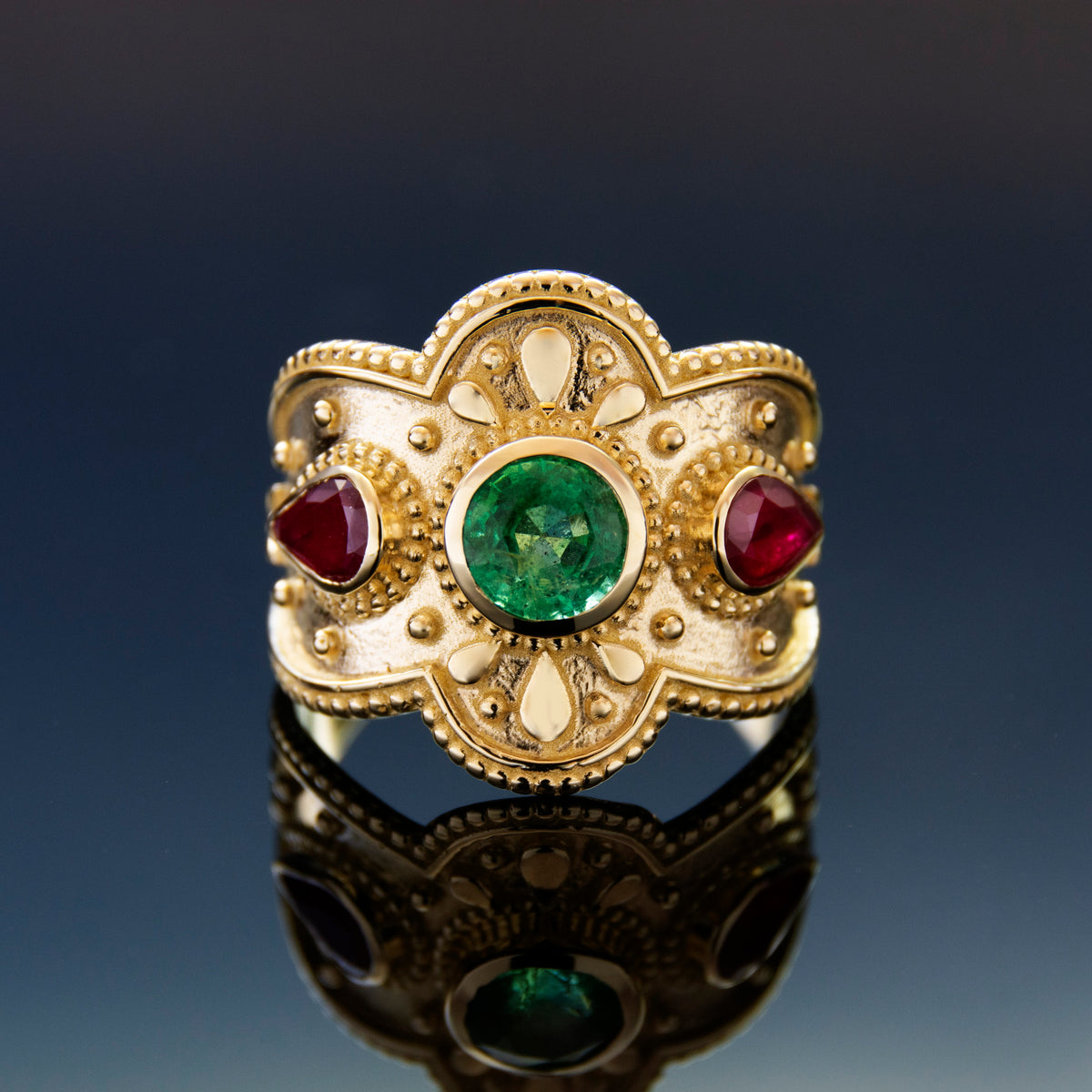 RG1934 Luxurious 14K Gold Statement Ring with Natural Emerald Centerpiece and Pear-Shaped Ruby Accents