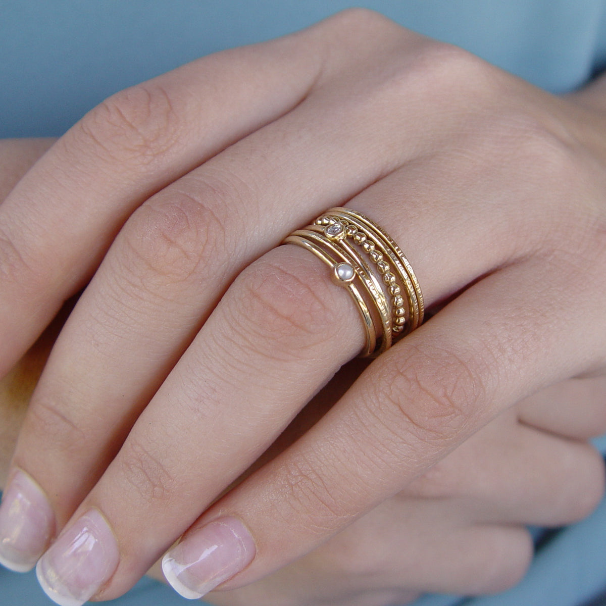 RG1802-3 Tiny gold Peridot ring