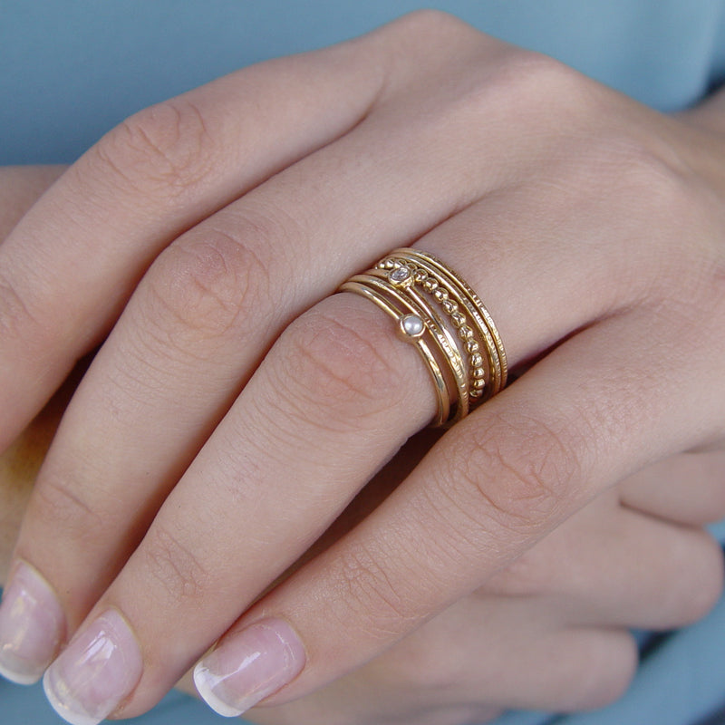 RG1802-3 Tiny gold Peridot ring