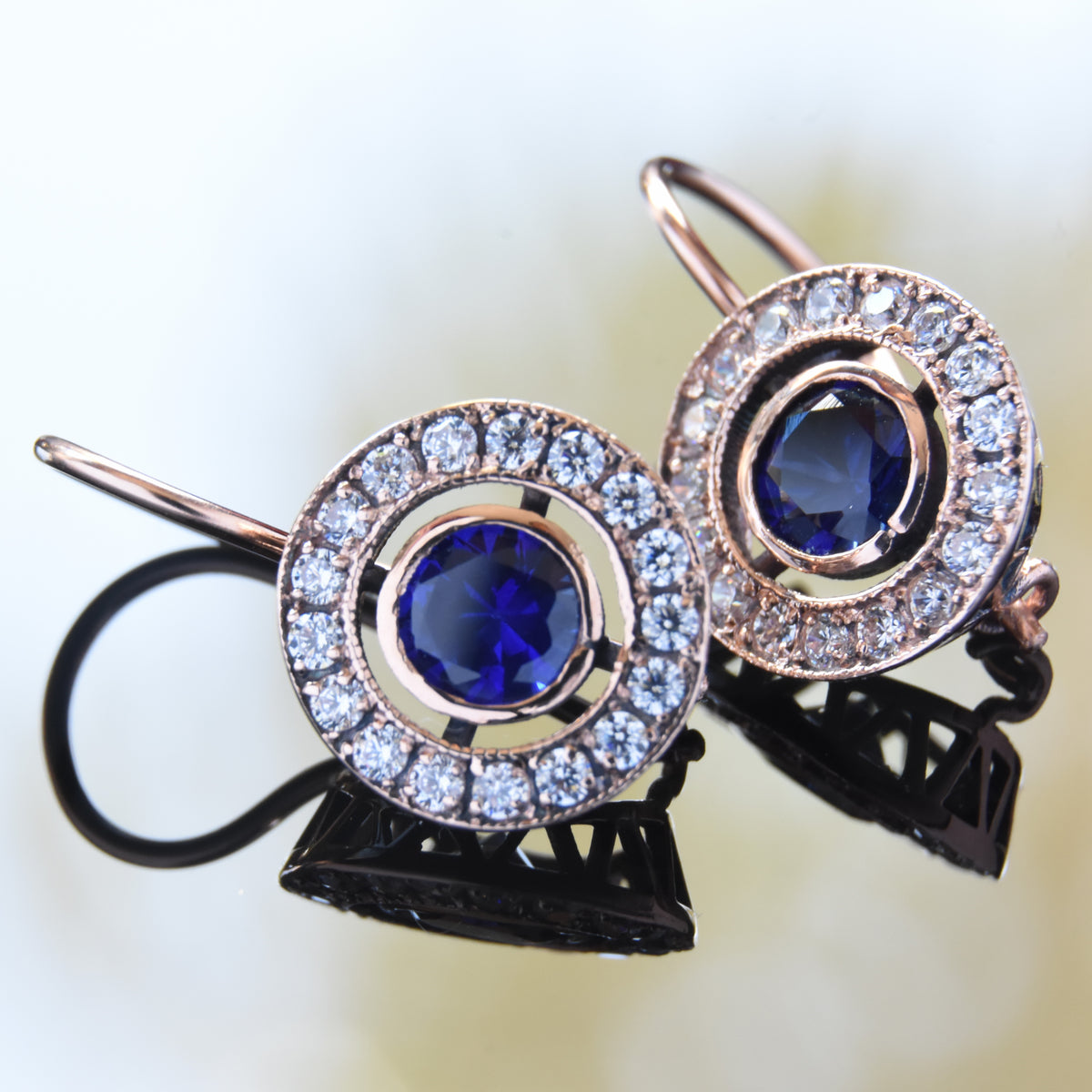 EG2219-1 Gold Drop Earrings with Blue Sapphire and Clear Zircons