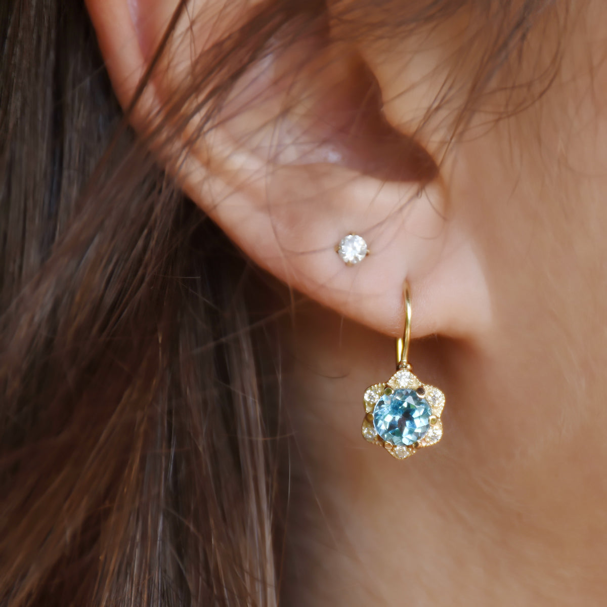 EG2228 Gold Flower Earrings with Blue Topaz