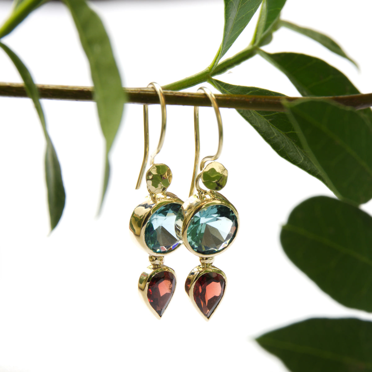 EG2233 Gold drop earrings with Blue Topaz and Garnet