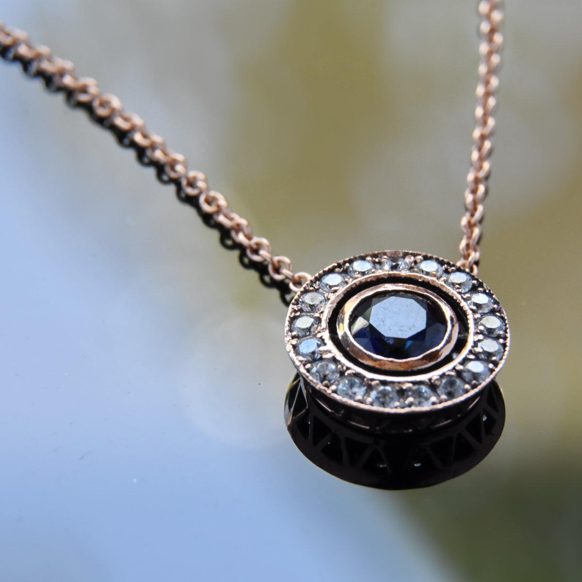 NG4752 Gold Necklace with Round Sapphire and Zircons Pendant