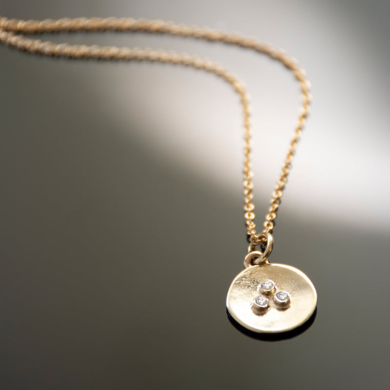 NG4767A Gold Round Charm Necklace with Three Diamonds