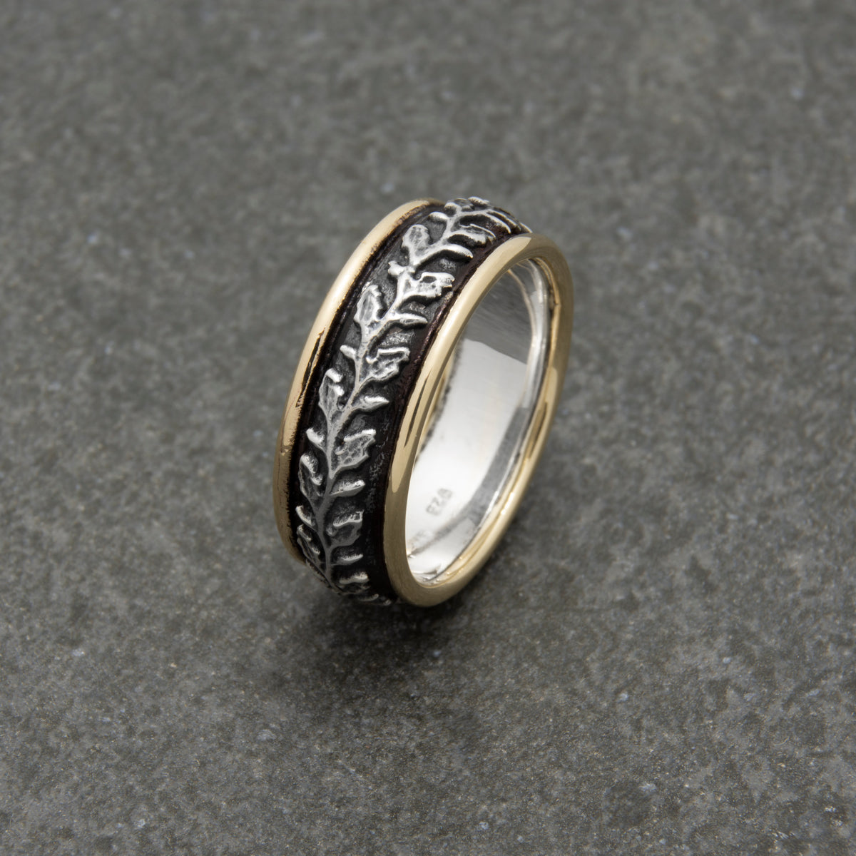 R0914 Rustic Silver Ring with Leaves and Gold Rim