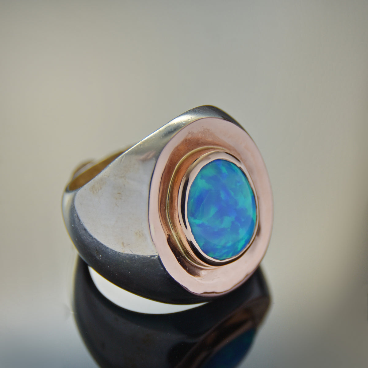 R1113XG Silver and Gold chunky ring with Oval Opal