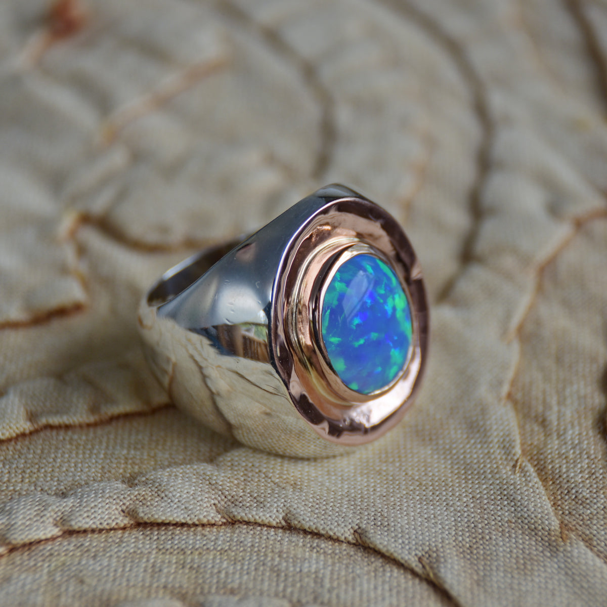 R1113XG Silver and Gold chunky ring with Oval Opal