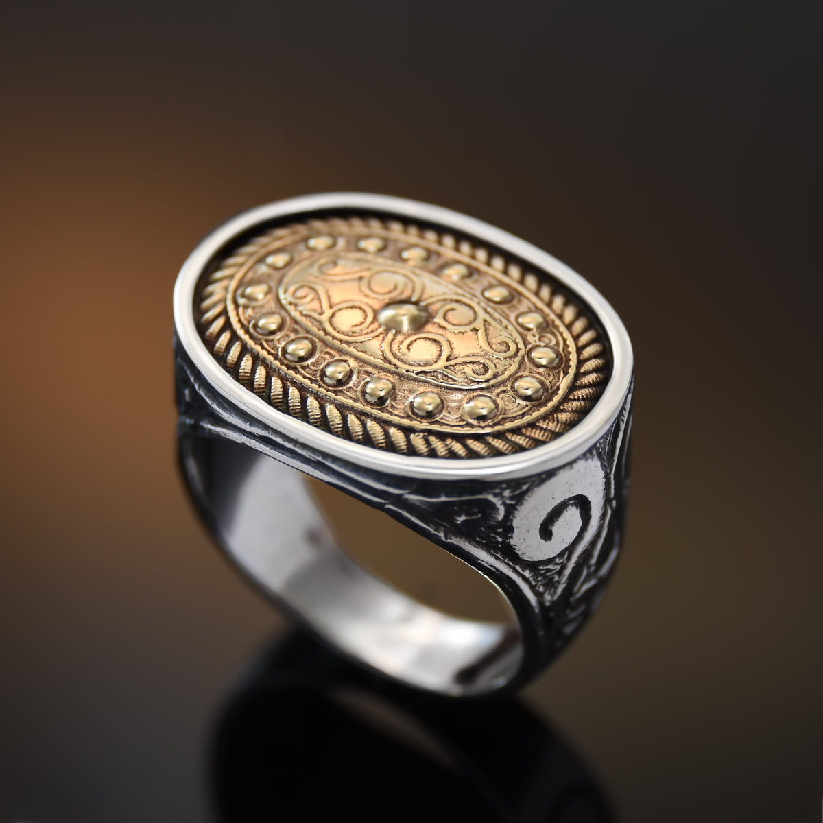 R1598-1 Large cocktail ring with ethnic motifs