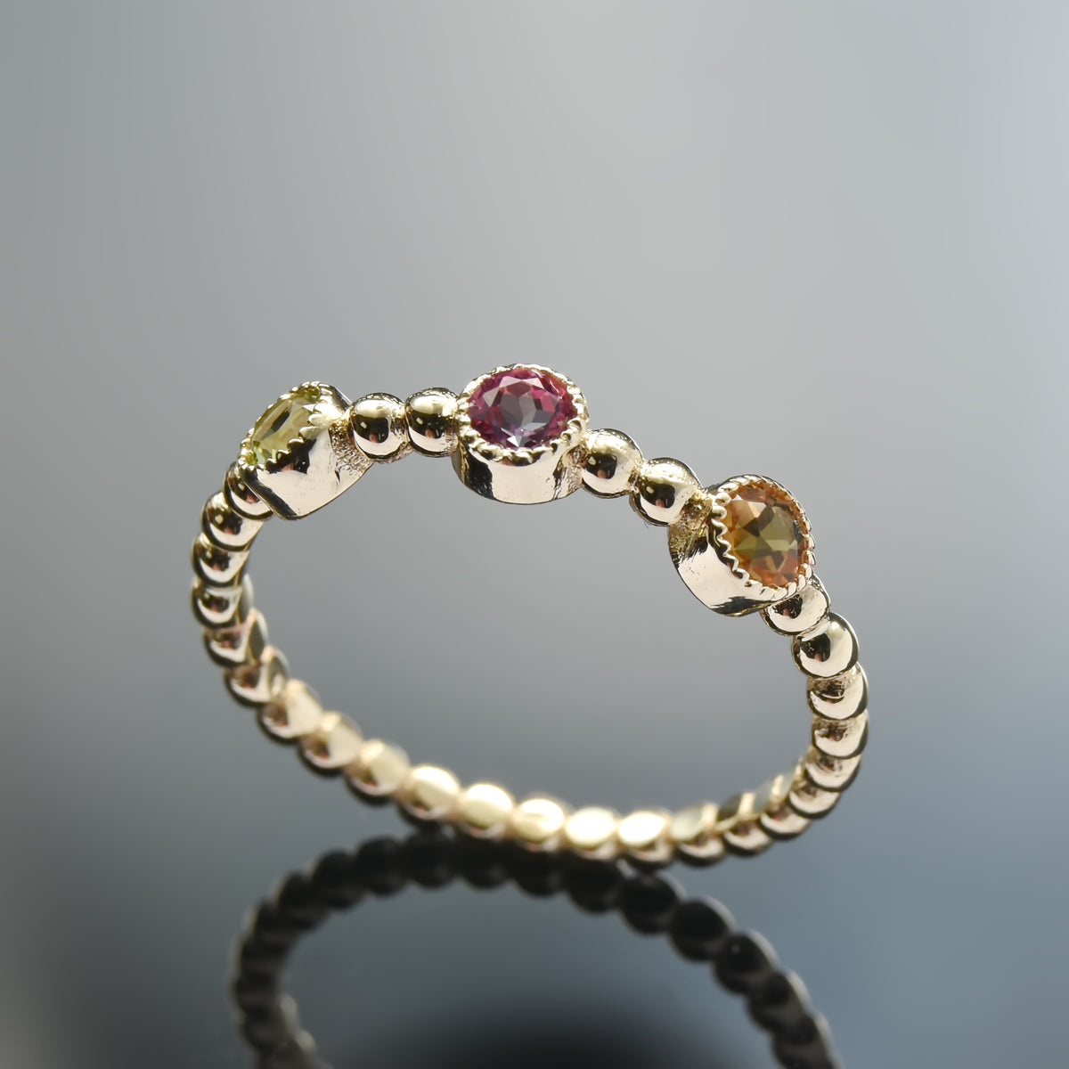 RG1830-2 Triple Gemstone Dotted Gold Band Ring