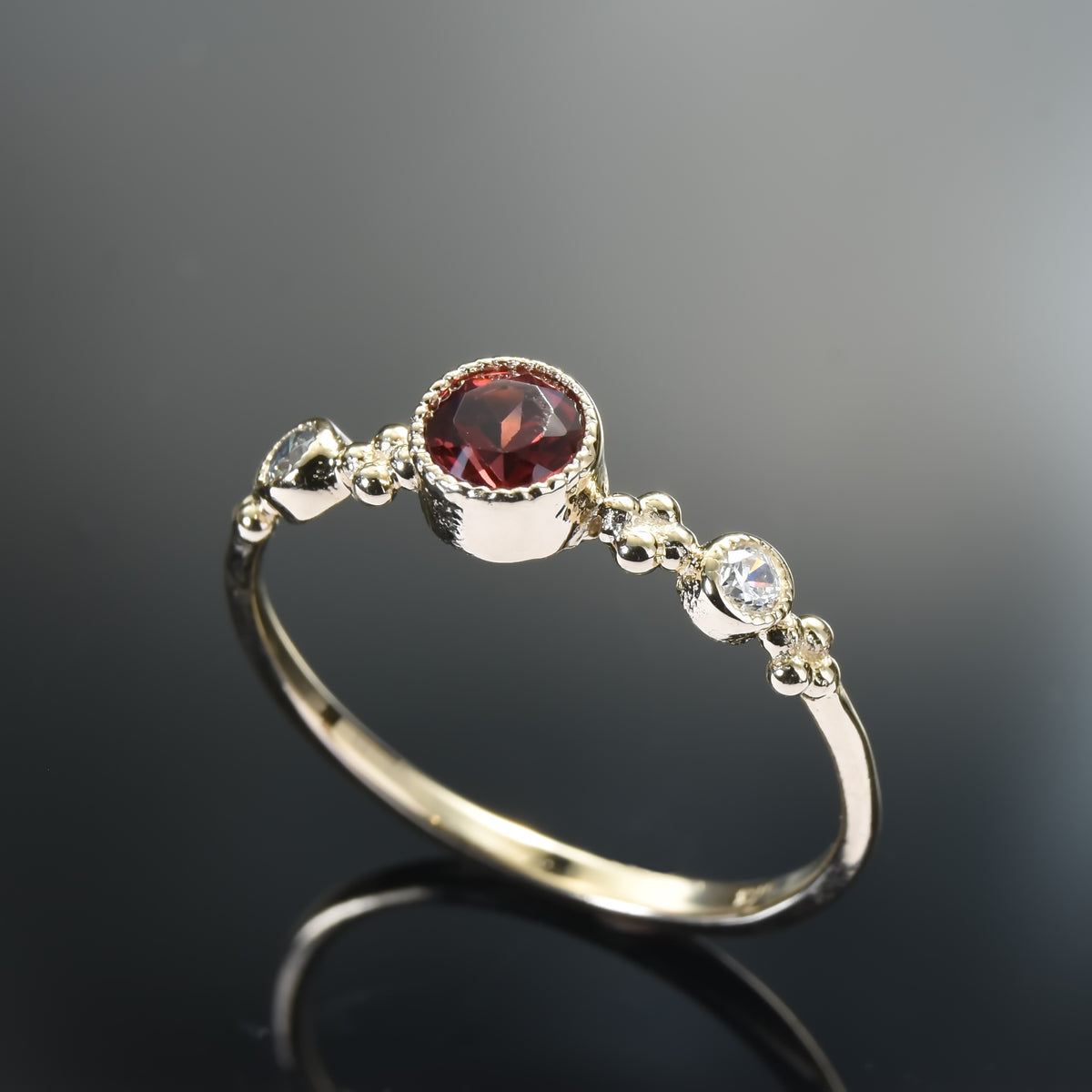 RG1831-1 Dainty Gold Ring with Garnet