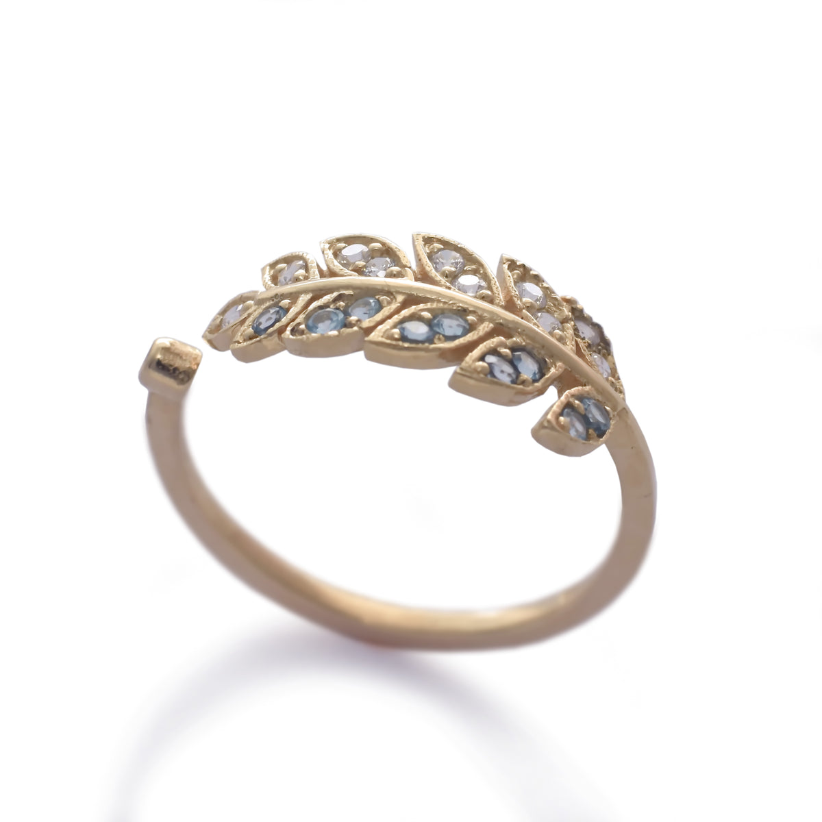 RG1835-2   Gold and Topaz open leaf ring