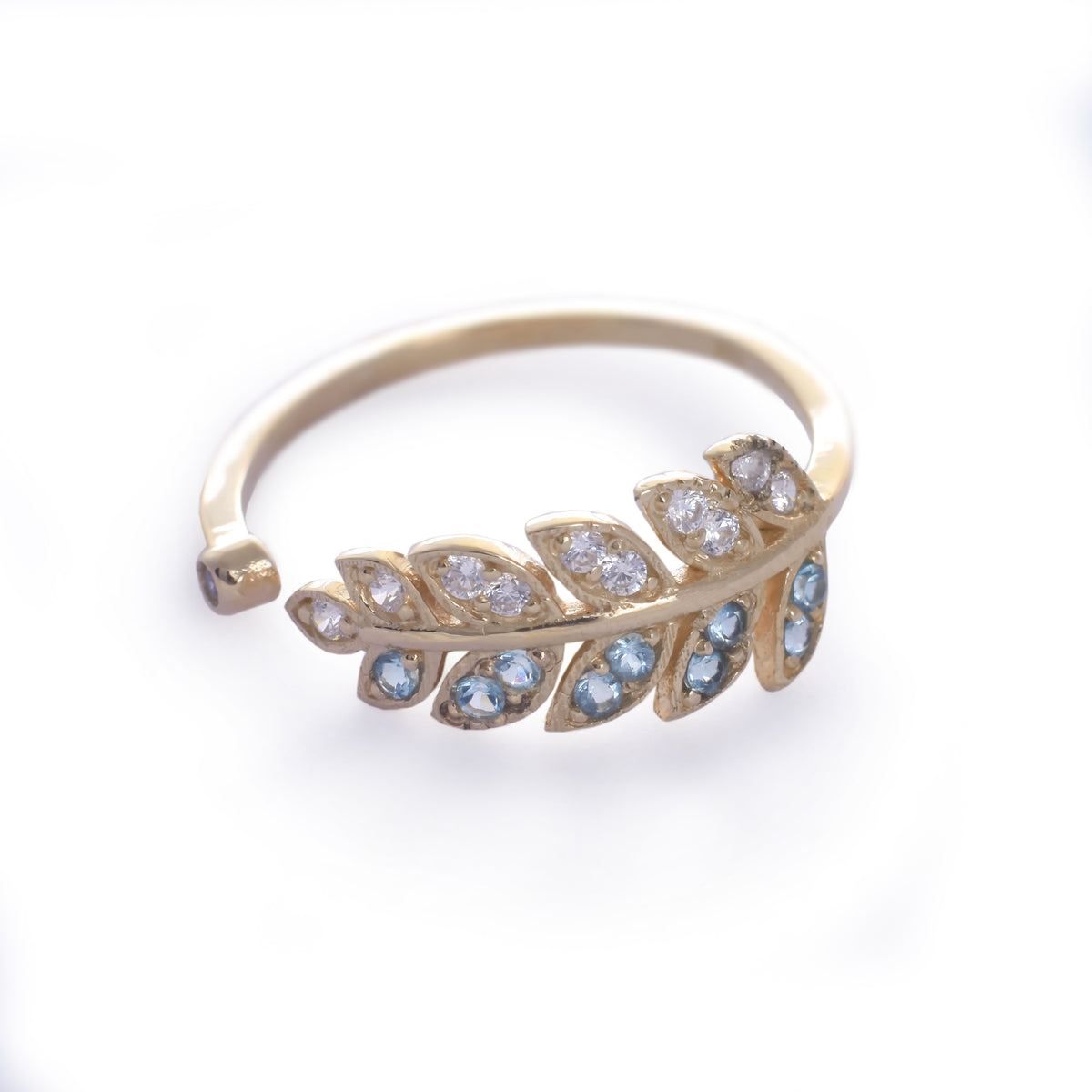 RG1835-2   Gold and Topaz open leaf ring