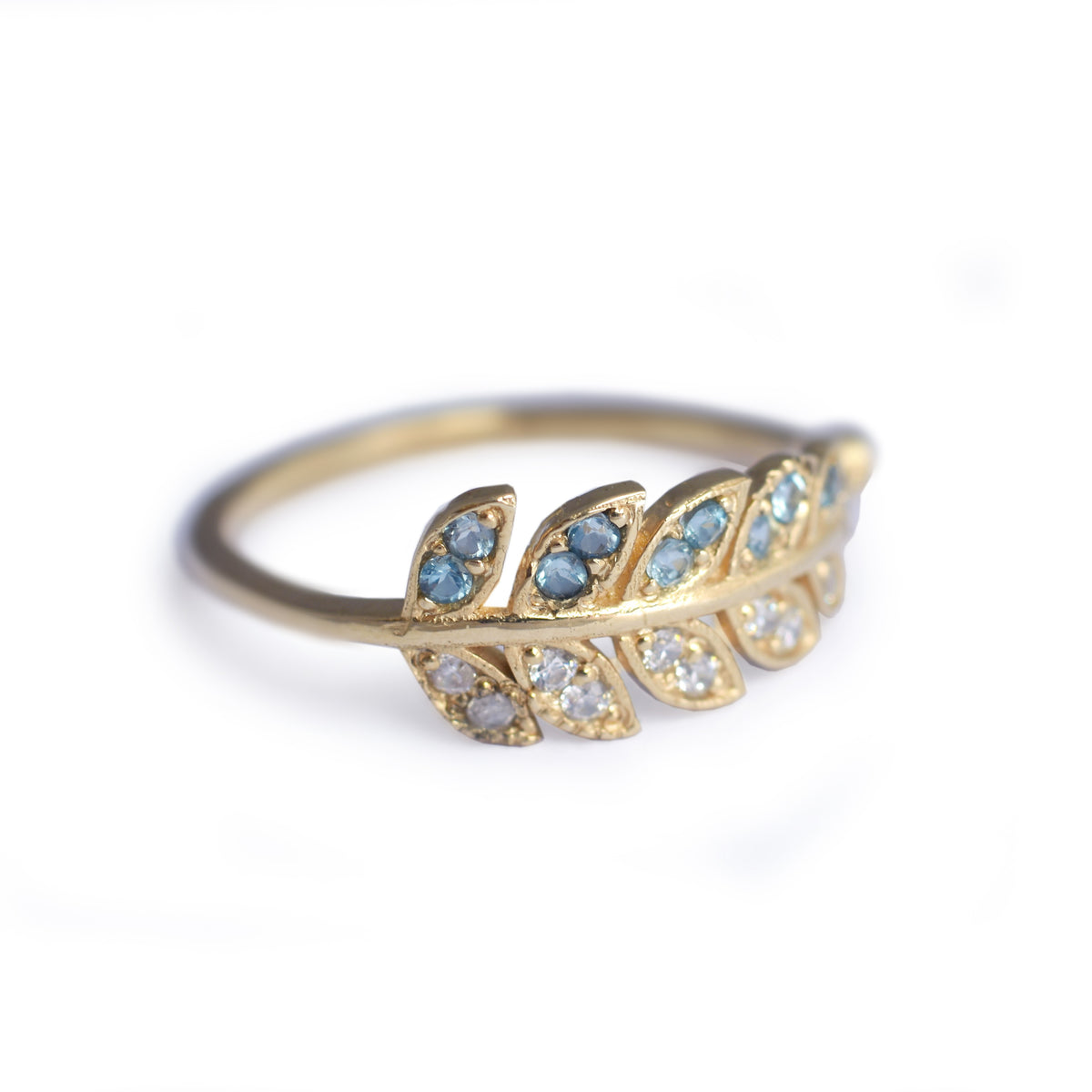 RG1835-2   Gold and Topaz open leaf ring