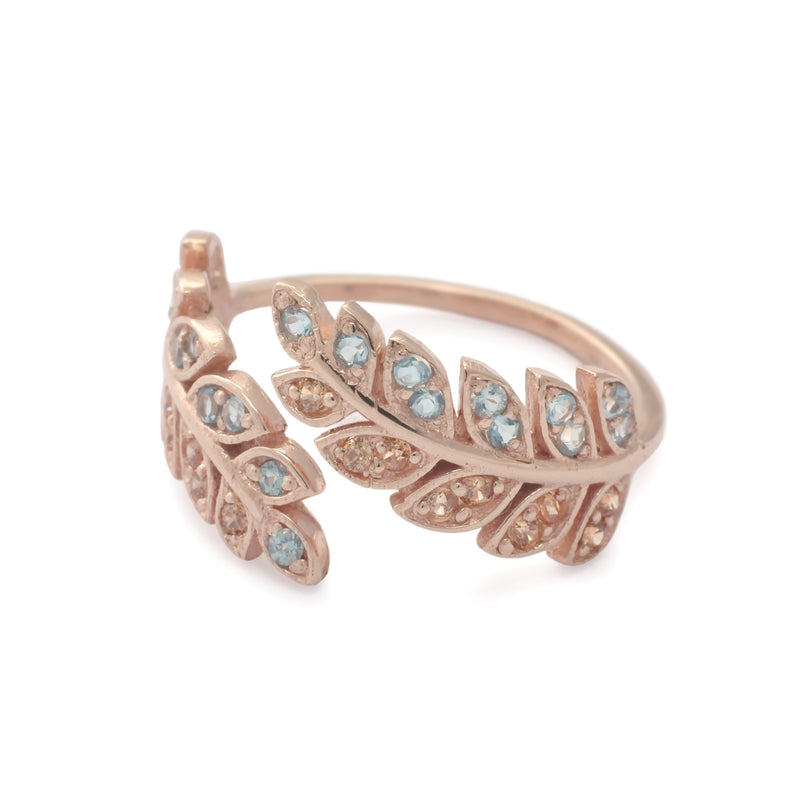 RG1836-1   Open leaves ring with Topaz and CZ