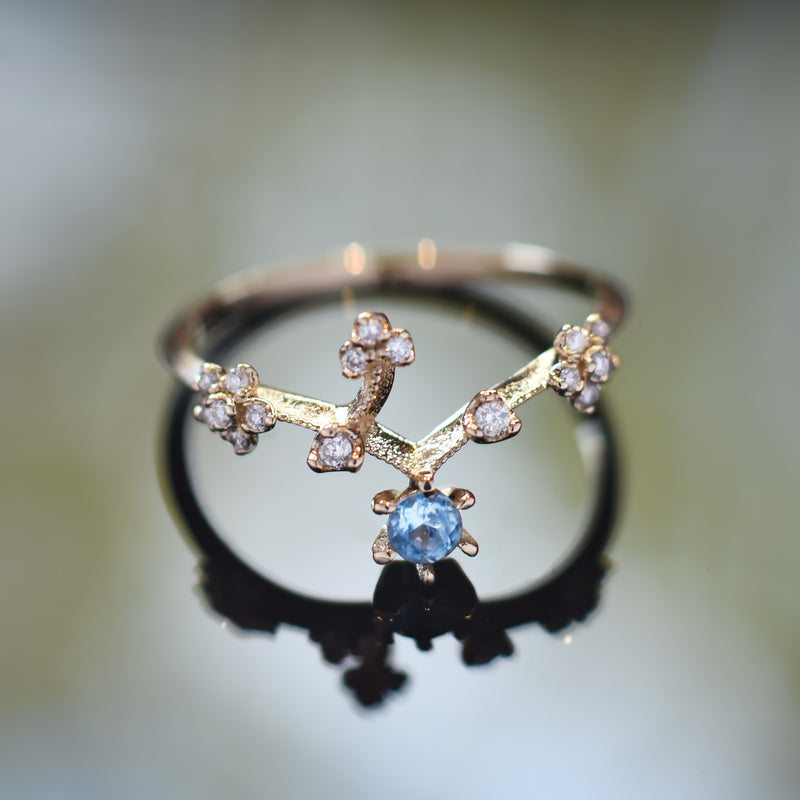 RG1844 Diamonds and Blue Topaz gold ring