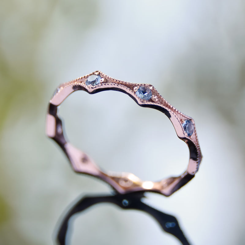RG1853-1 Eternity Rose Gold Ring with Blue Topaz