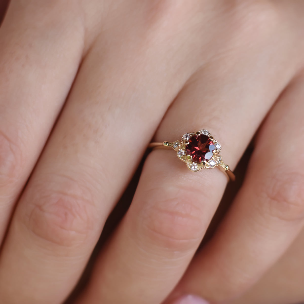 RG1854 Gold flower ring with Garnet and CZ