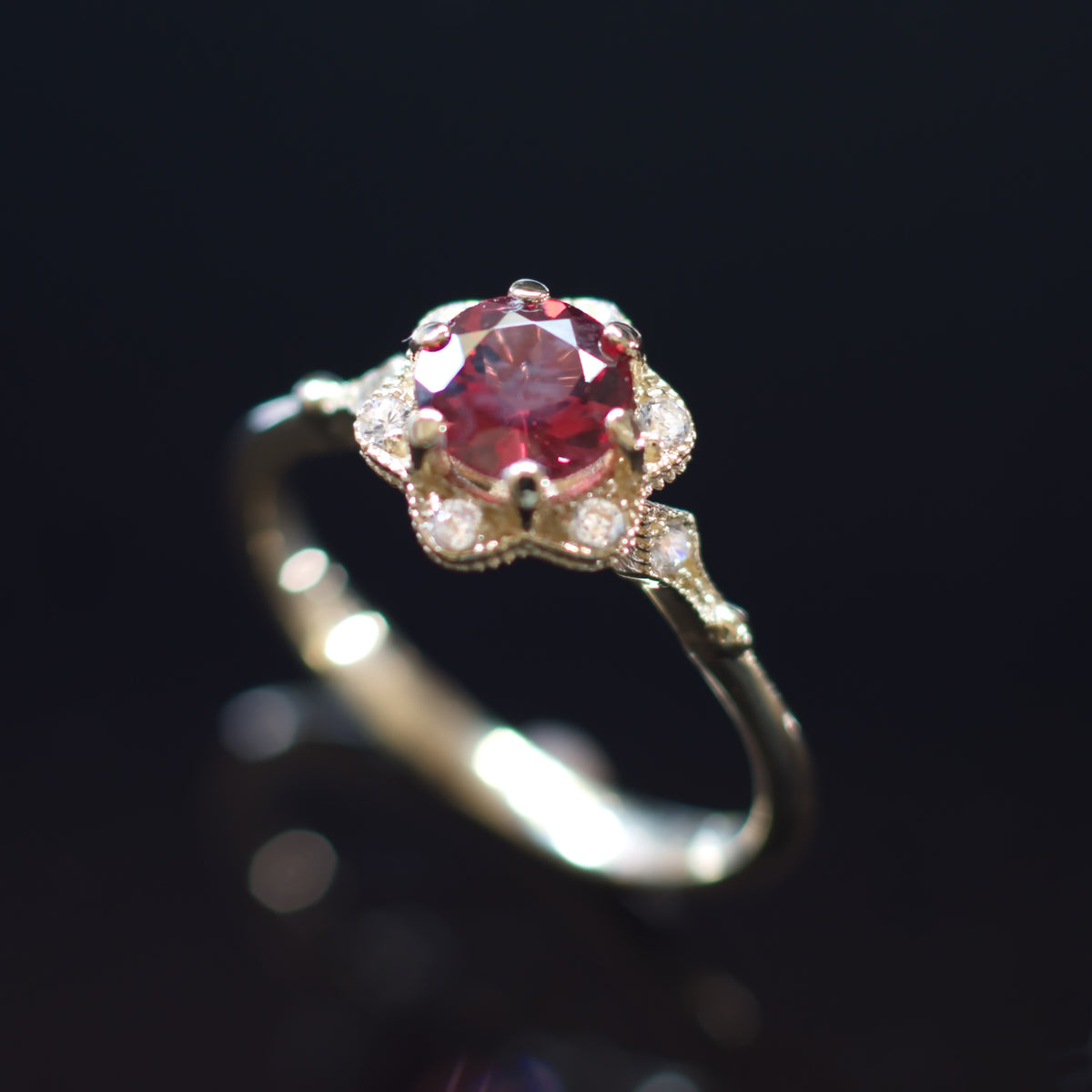 RG1854 Gold flower ring with Garnet and CZ