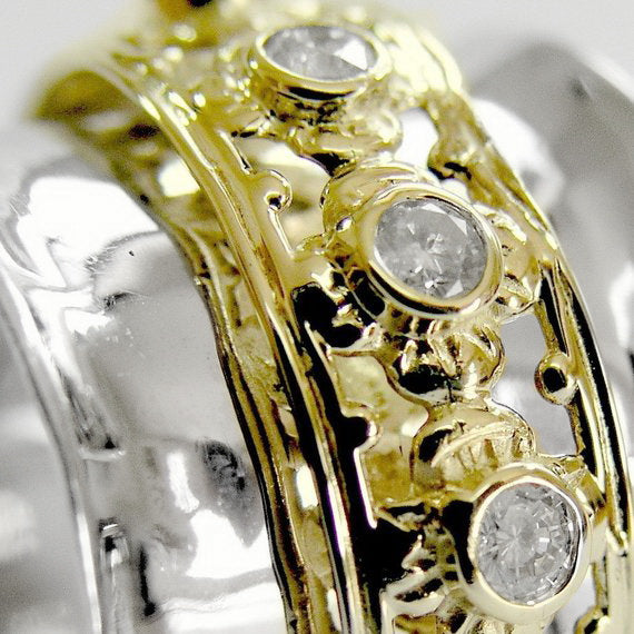 RG1149XZ Gold and Diamonds spinner ring