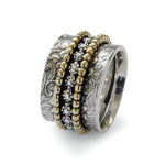 R1209J Brass and silver dotted spinner ring