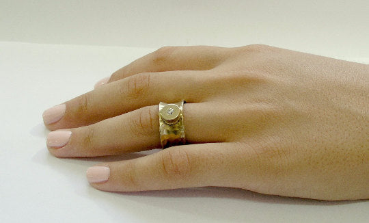 RG1019B Hammered Gold band with Diamond.