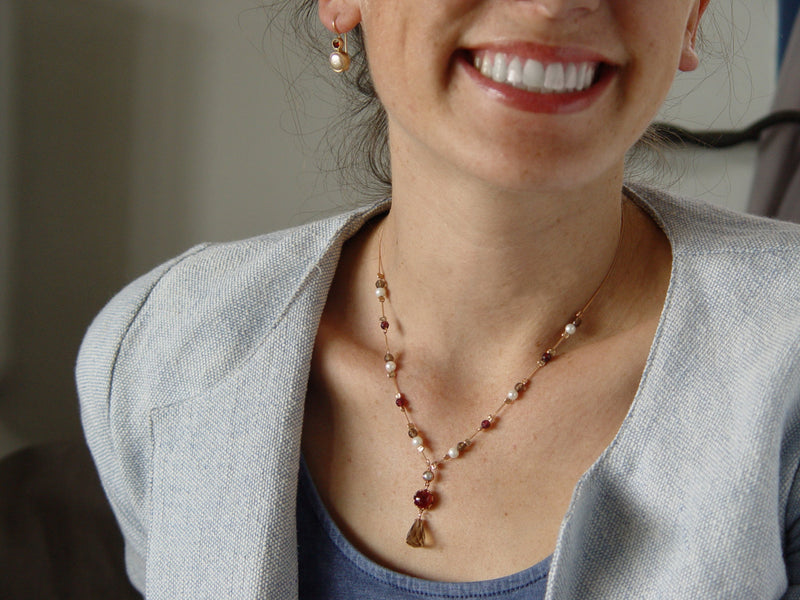 NG0862-1 Gold station necklace with Garnet, Pearls and Smokey Quartz