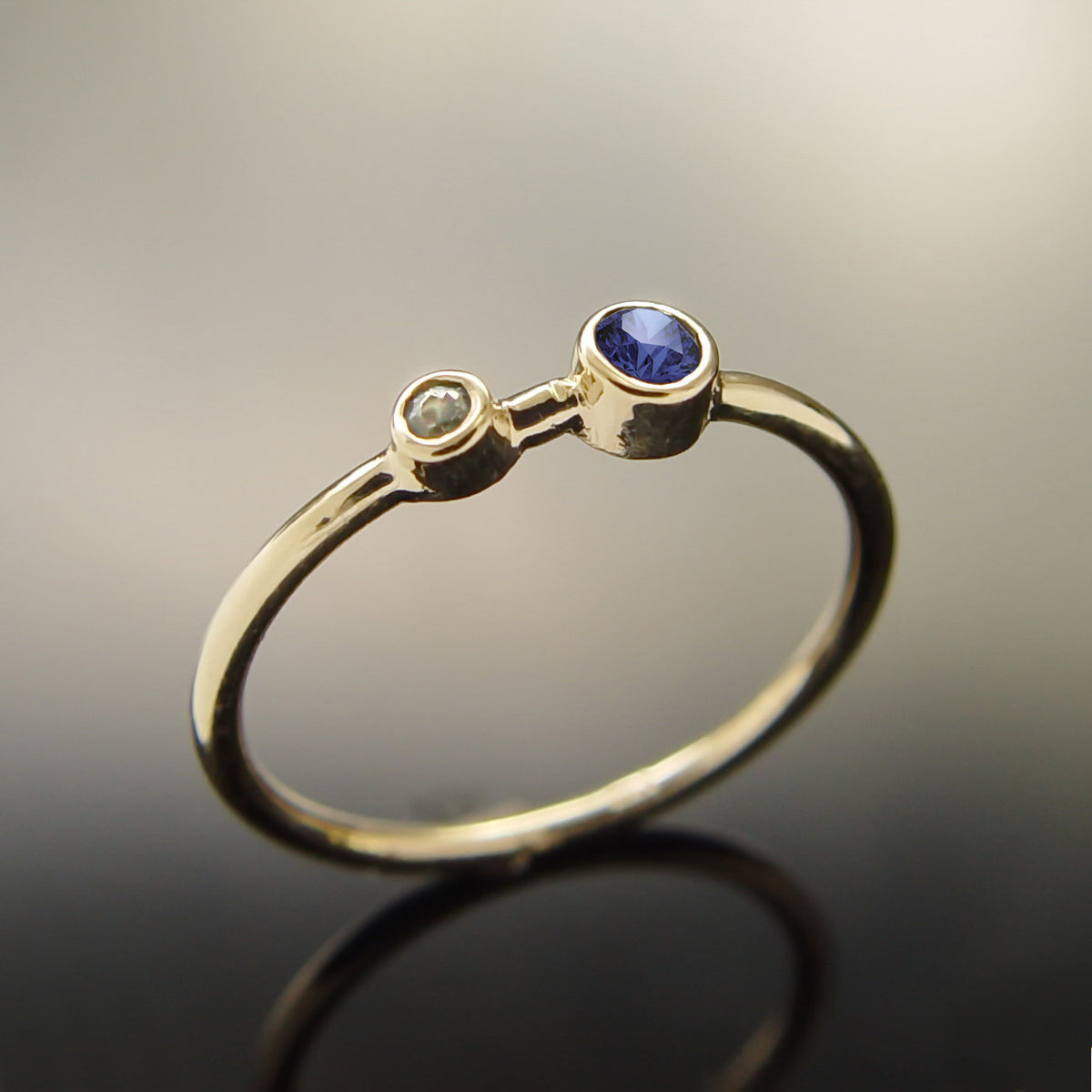 RG1803-1 Sapphire and Topaz gold ring