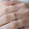 RG1802-3 Tiny gold Peridot ring