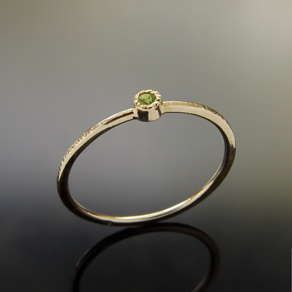 RG1802-3 Tiny gold Peridot ring