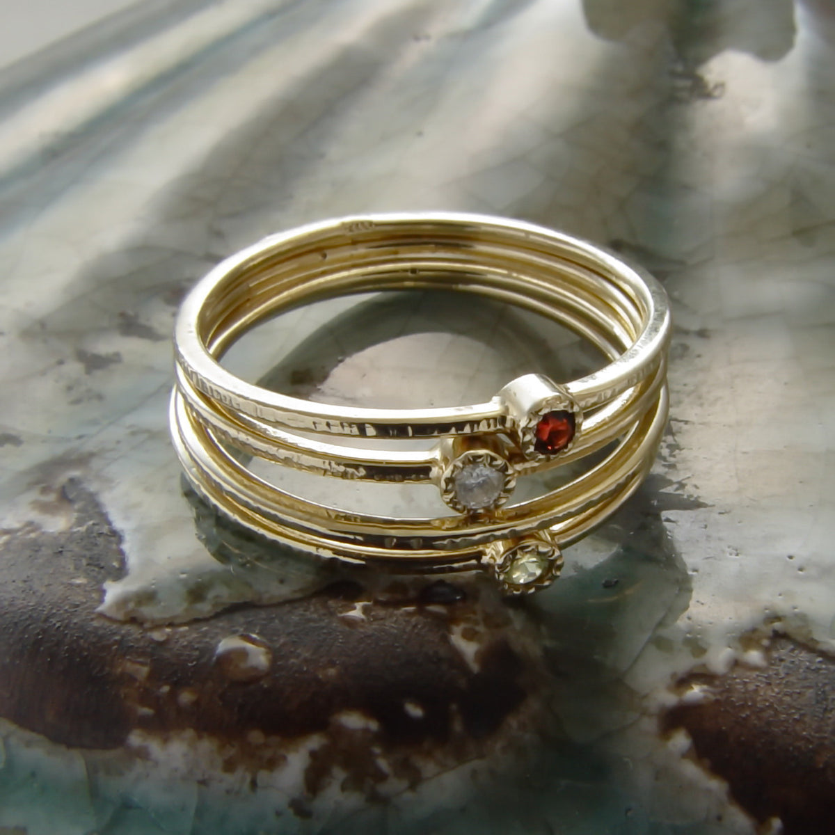 RG1806-4 Gold and Garnet Stacking ring