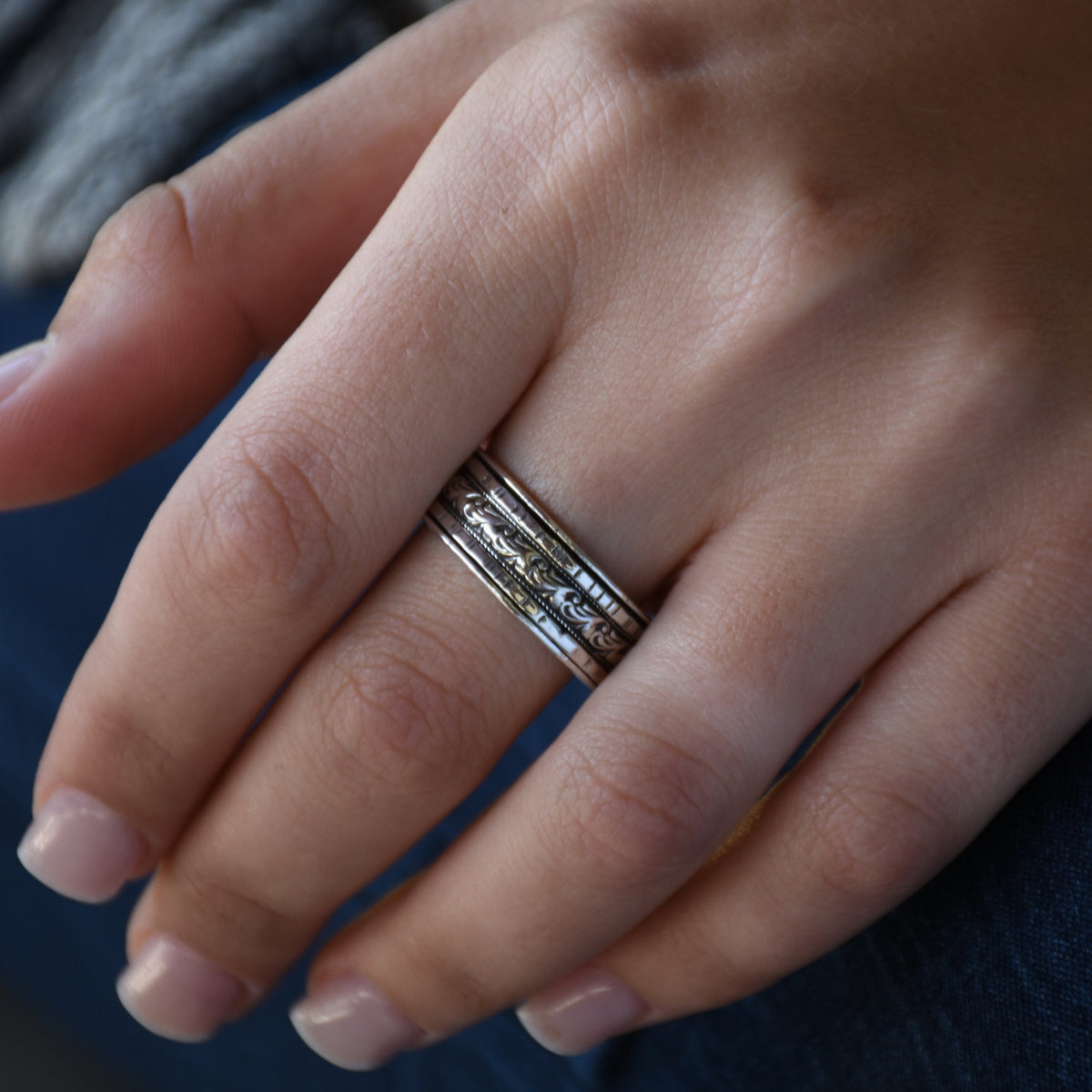 R1149D Silver Botanical spinner ring