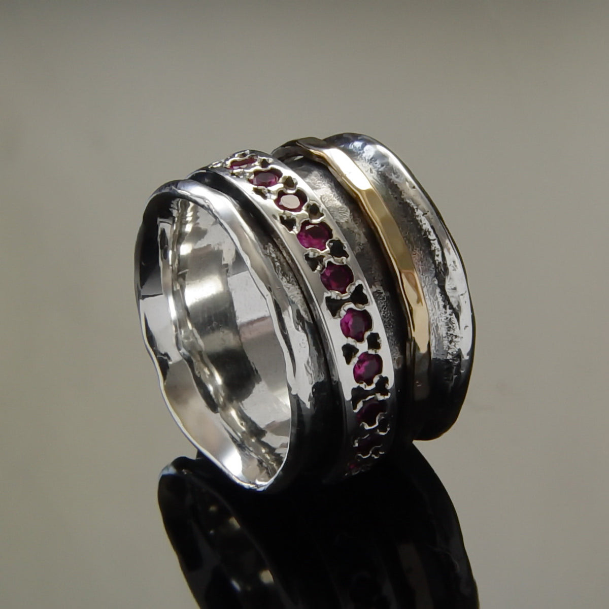 R1075M Rustic Silver Spinner Ring with Ruby