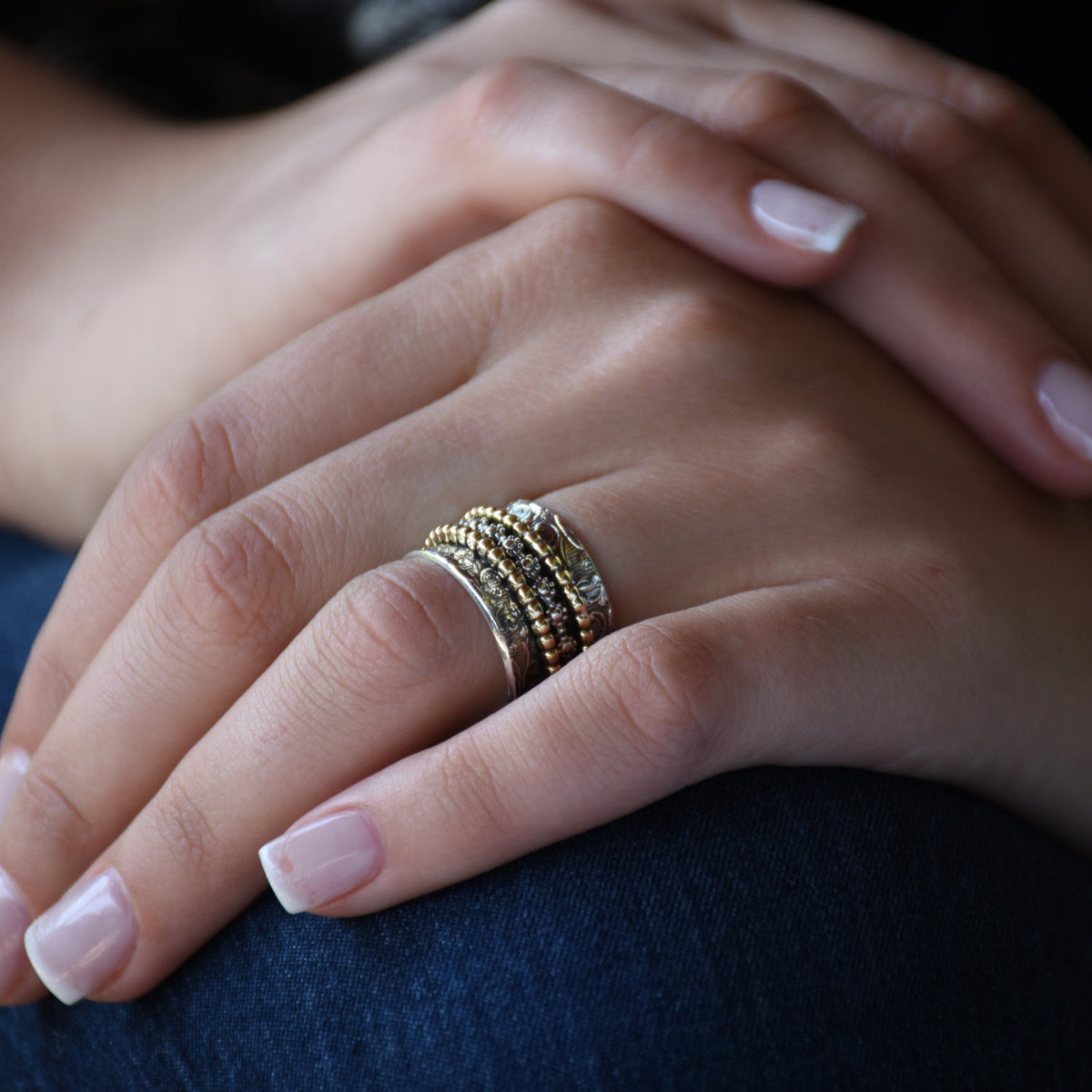 R1209J Spinner Ring with Textured Floral and Dotted Design